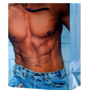 Man in torn denim shorts gift bag